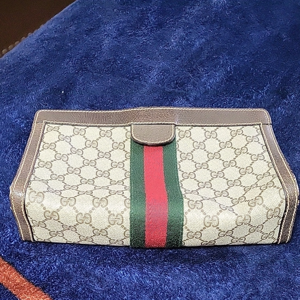 Gucci Monogram Canvas Clutch